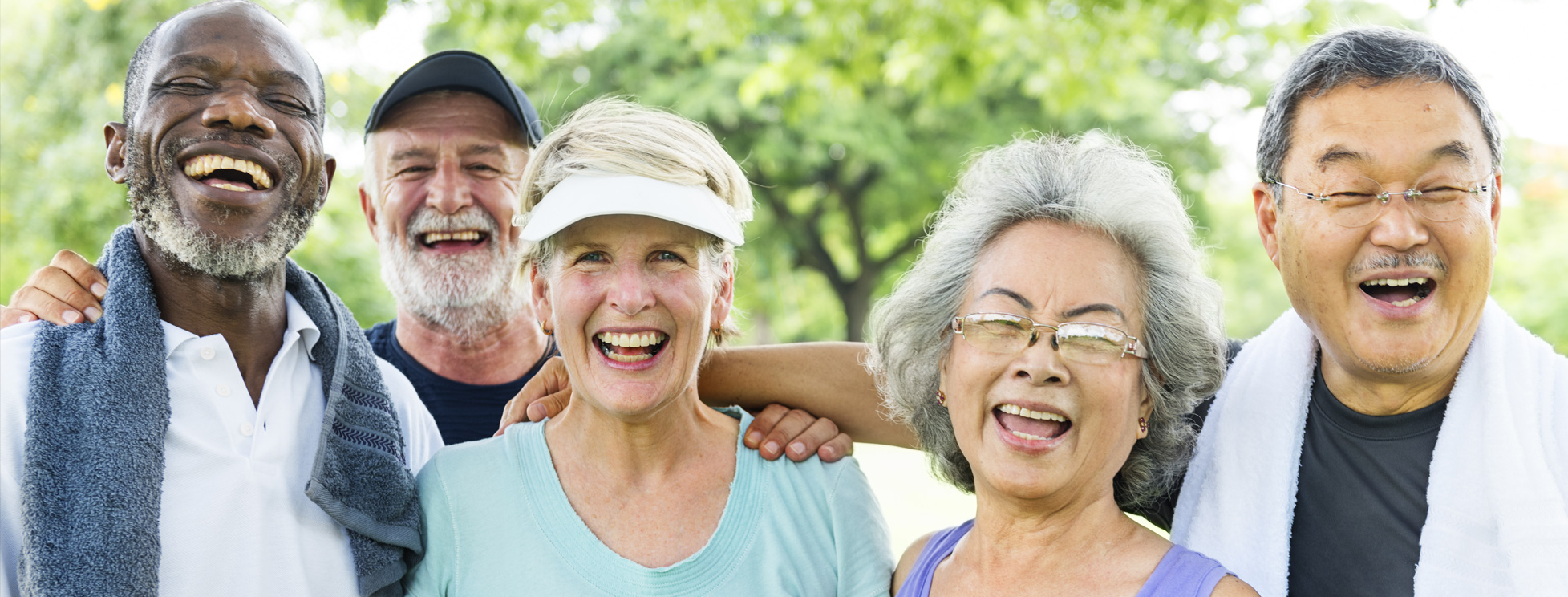 Elderly men and women smiling after a workout class at Oasis Wellness Center in Grossmont Center.