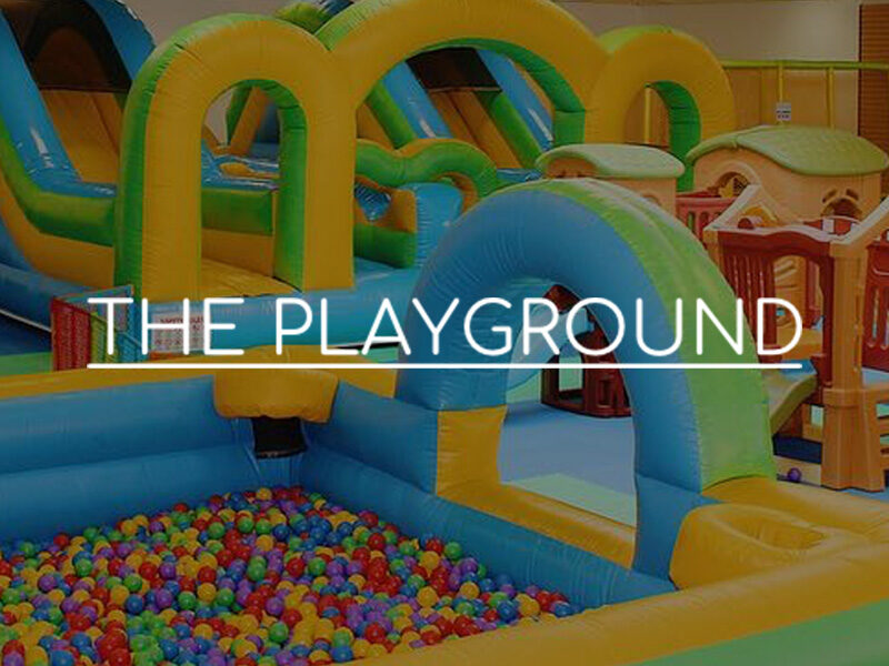 Kids can run wild in bouncy castles and fun ball pits at The Playground in Grossmont Center La Mesa.